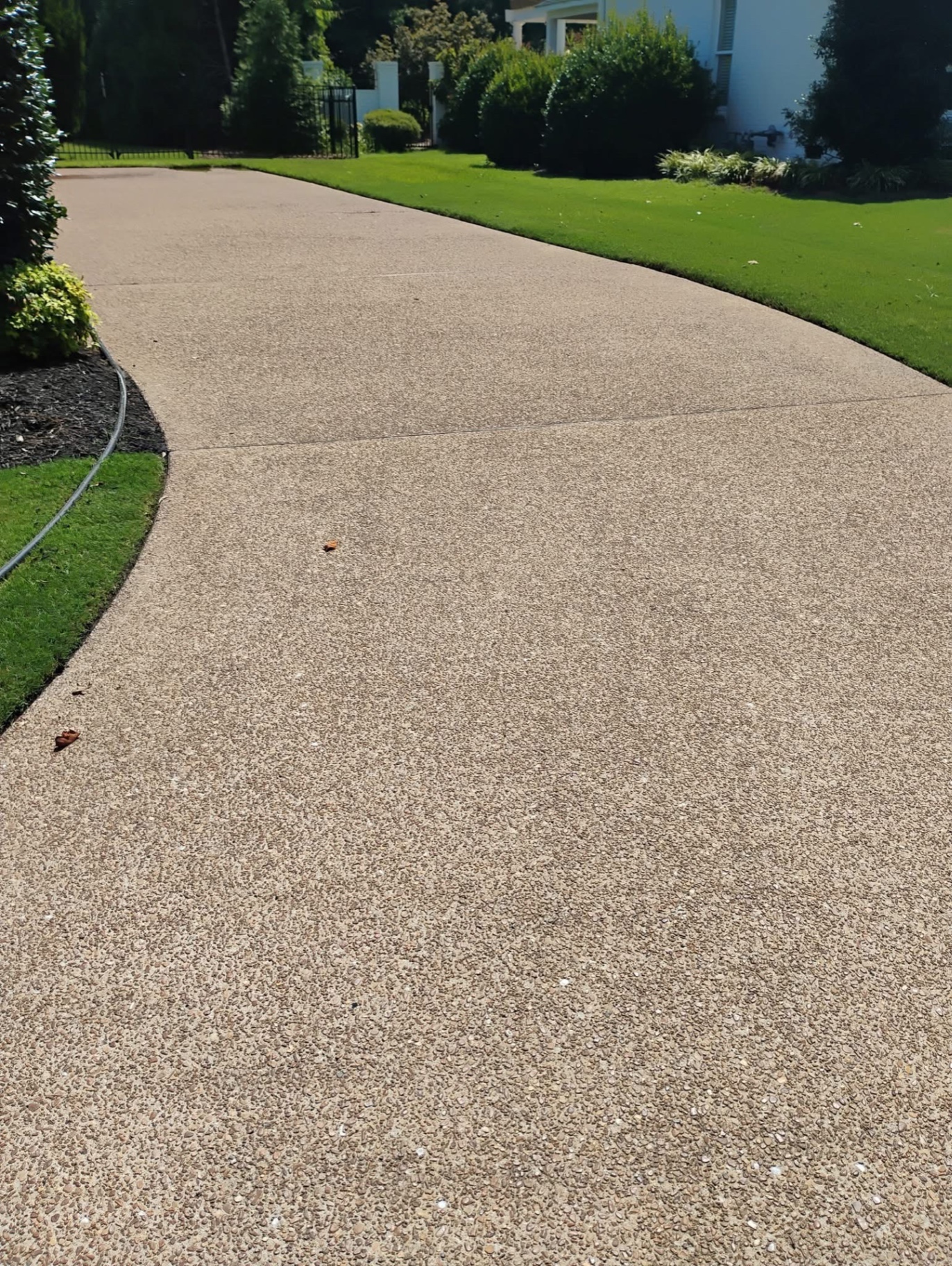 Concrete Driveway — Oil & Stain Removal, after professional cleaning by Mobile Magic in Jackson, TN